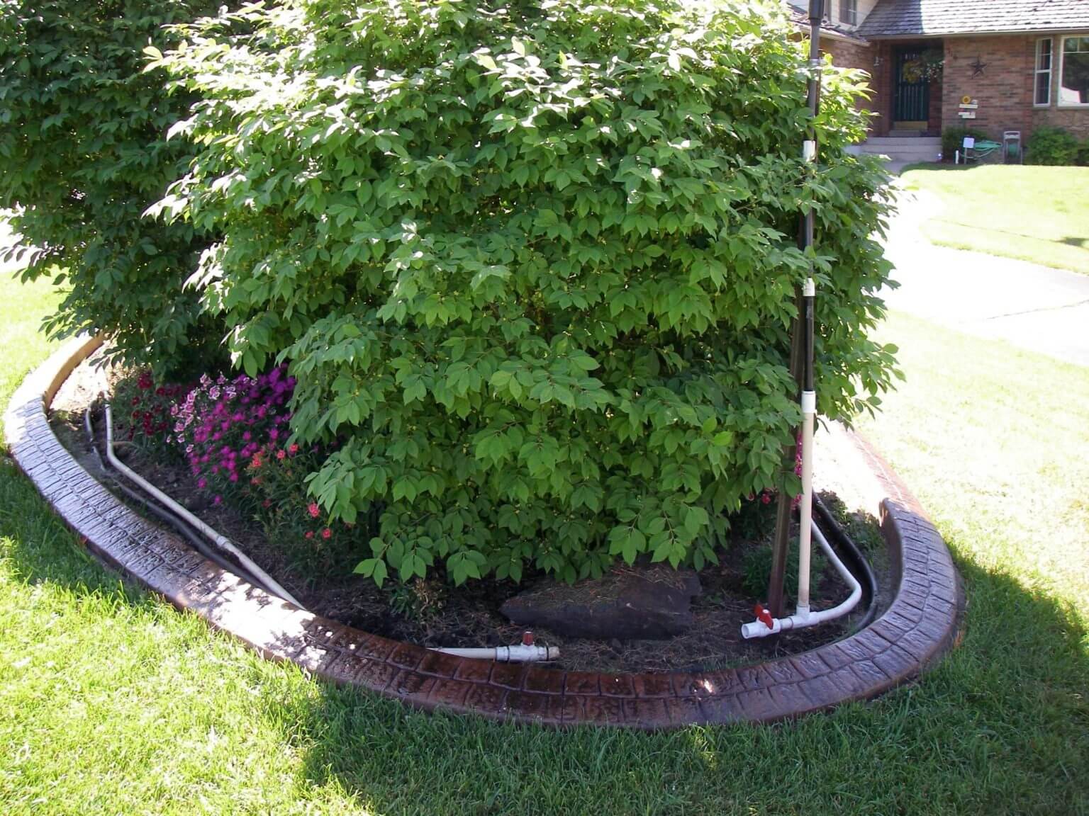 Stamped and stained concrete curbing contracting services in Hyrum, Utah